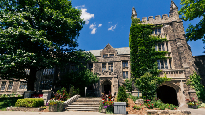 Exterior of University Hall during summer.