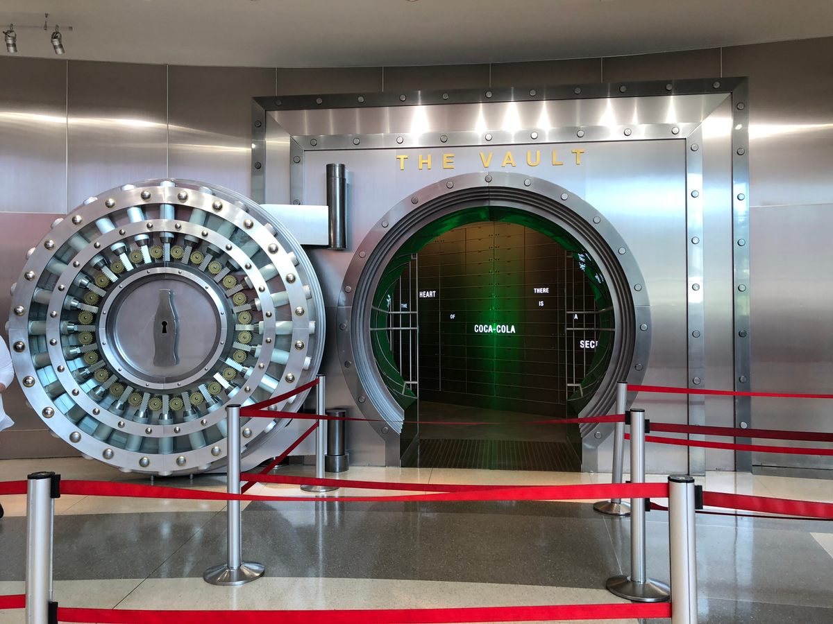 Front of the Coca-Cola Vault, the large round vault door is swung open and the words "The Vault" are emblazoned above.
